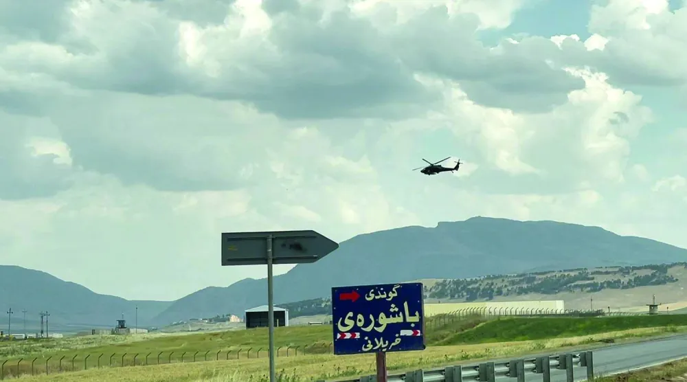 An American helicopter flies near the Harir Air Base in Erbil, Iraqi Kurdistan (Rudaw file photo)