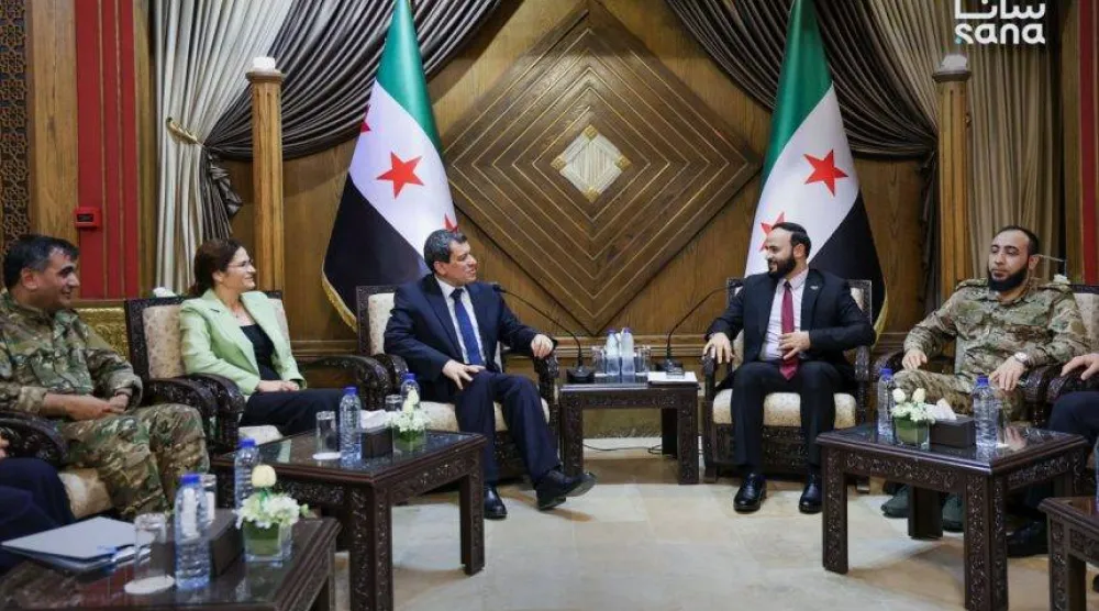 من اللقاء في مركز محافظة حلب (سانا)