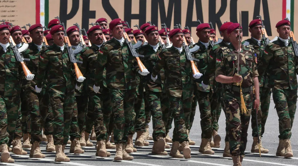 قوات من «البيشمركة» خلال احتفال في أربيل عاصمة إقليم كردستان عام 2023 (أ.ف.ب)