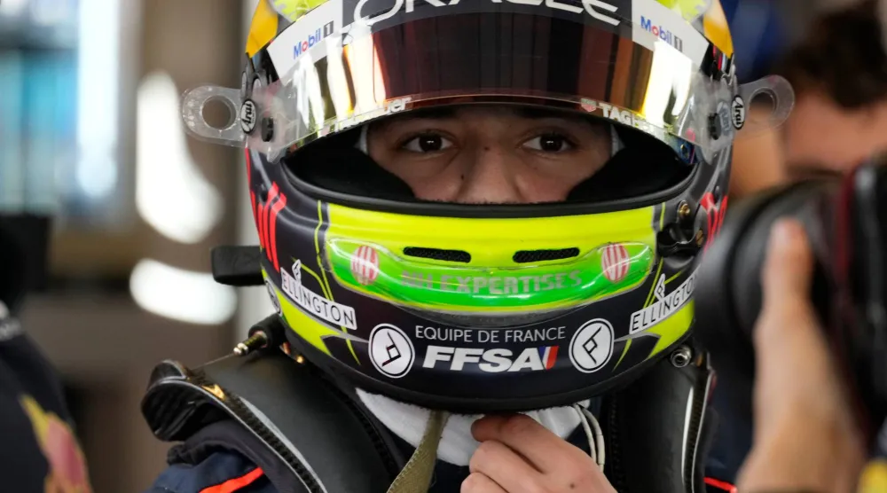 FILE - Red Bull driver Isack Hadjar prepares for the first practice ahead of the Abu Dhabi Formula One Grand Prix at the Yas Marina Circuit, Abu Dhabi, UAE, on Nov. 24, 2023. (AP Photo/Kamran Jebreili, File)