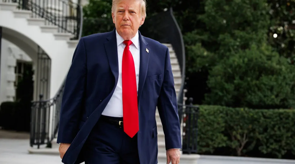 US President Donald Trump walks out of the South Portico towards members of the press before departing from the new South Lawn helipad in Marine One at the White House in Washington, DC, USA, 26 September 2026. EPA/Samuel Corum / POOL