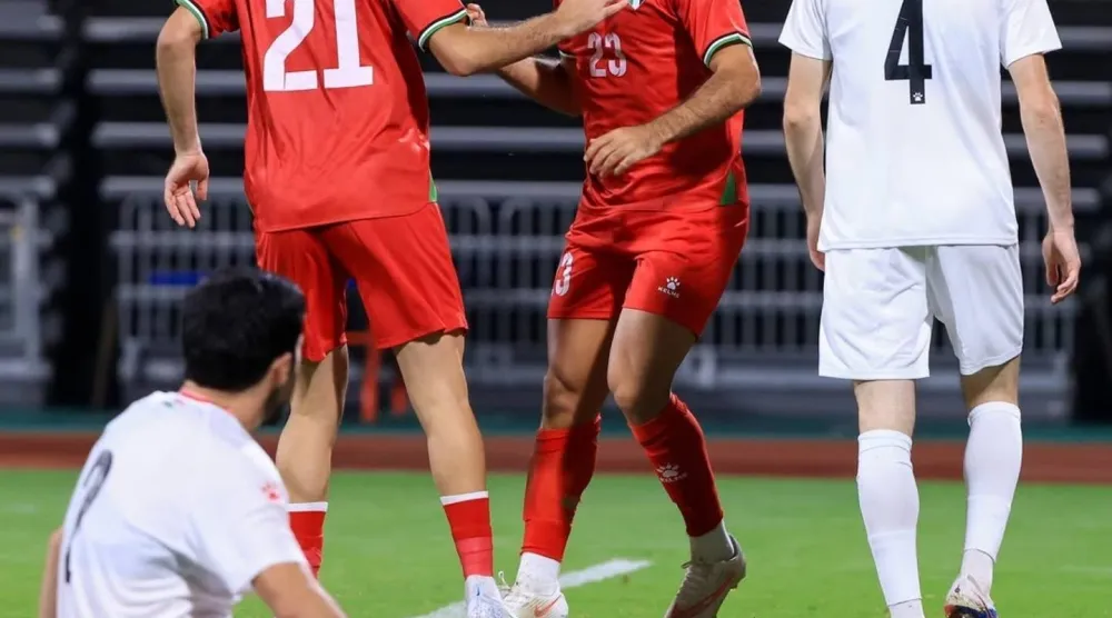 فرحة لاعبي فلسطين بالتسجيل في مرمى طاجيكستان (الاتحاد الفلسطيني)