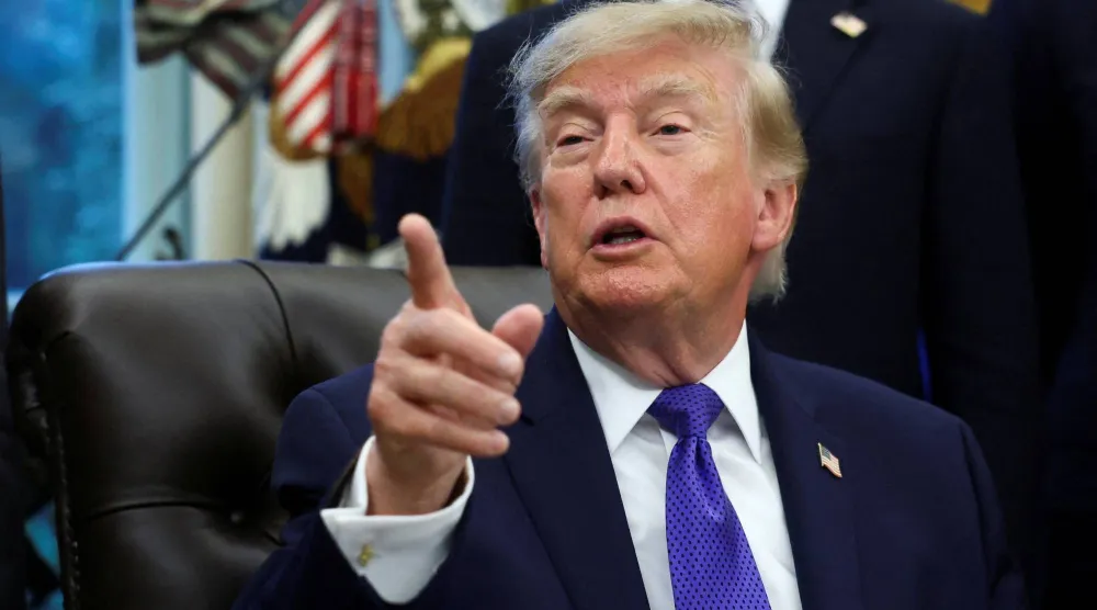 US President Donald Trump takes questions at the Oval Office at the White House in Washington, D.C., US, September 28, 2026. REUTERS/Kevin Lamarque