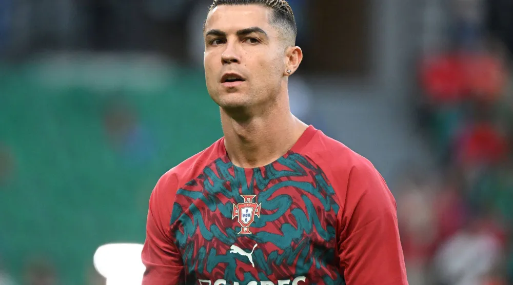 كريستيانو رونالدو خلال الإحماء قبل مباراة البرتغال وويلز في دوري الأمم الأوروبية (د.ب.أ)