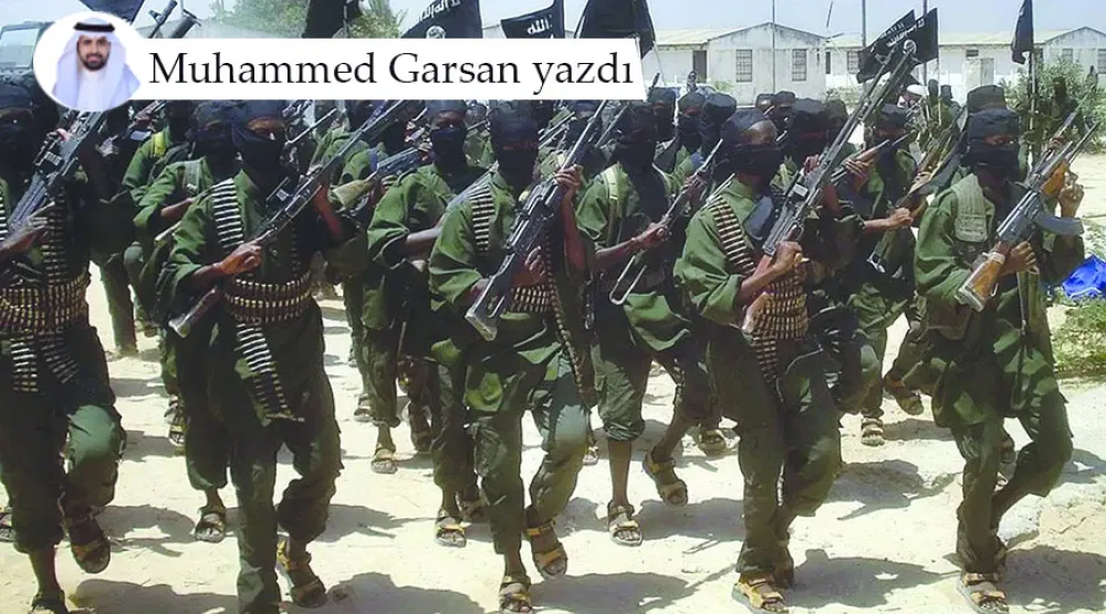 (foto altı) Somali’deki eş-Şebab örgütünün üyeleri (Arşiv – AFP)