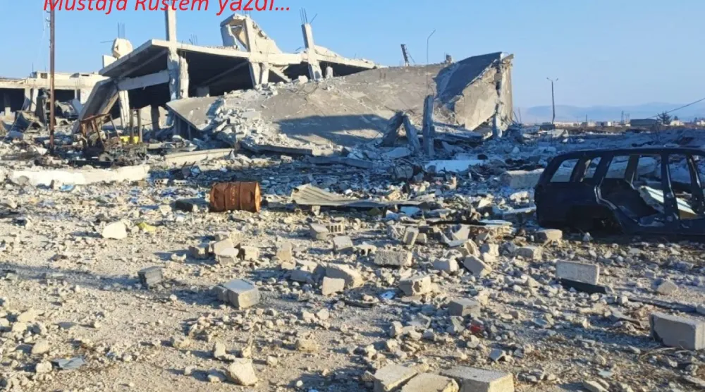 Humus kırsalındaki el-Kusayr kentinde Hizbullah’a ait tahrip olmuş bir karargâh (Independent Arabia)