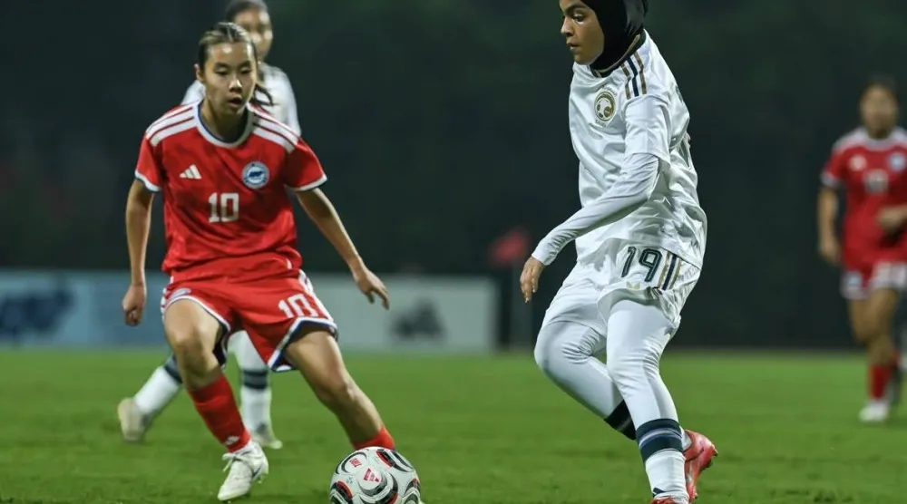 من لقاء الأخضر بنظيره السنغافوري (الاتحاد السعودي) 