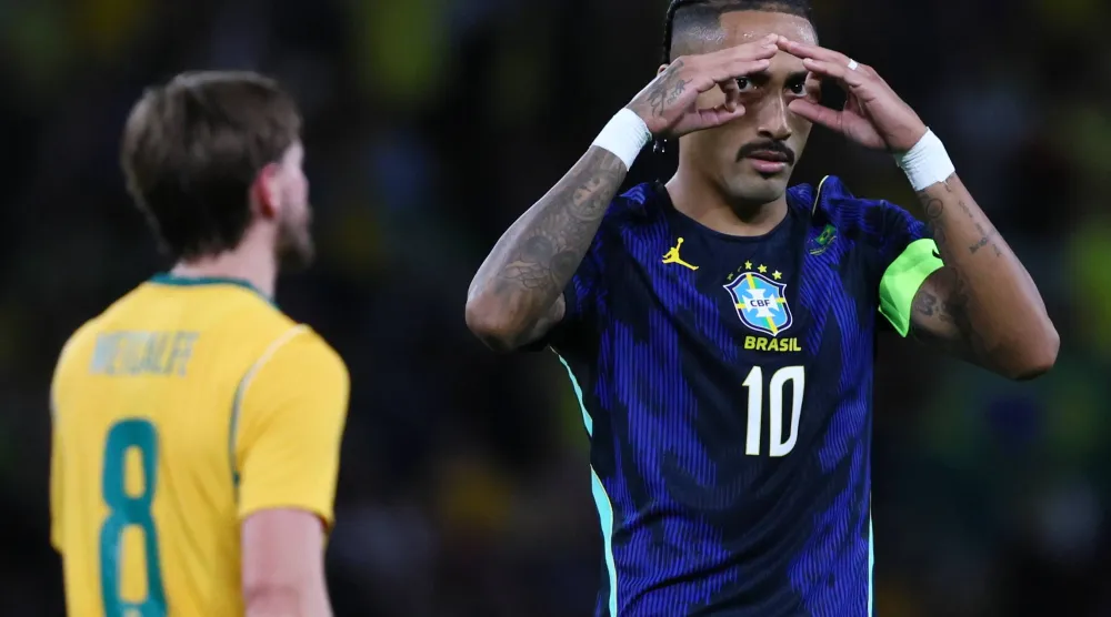 قائد النادي الكاتالوني ومنتخب البرازيل رافينيا (أ.ب)