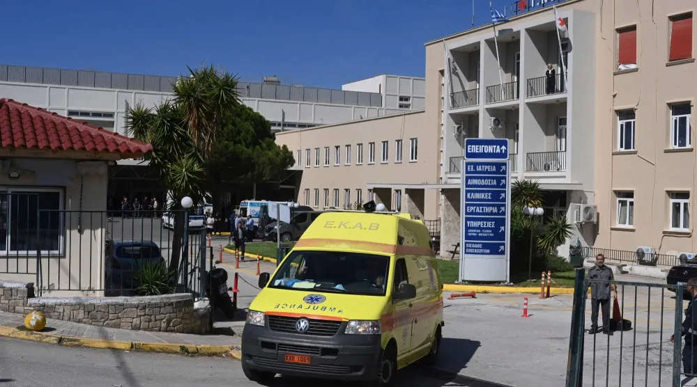 An ambulance leaves Corinth General Hospital, in Greece, Friday, Oct. 9, 2026. (AP Photo/Vasilis Psomas)