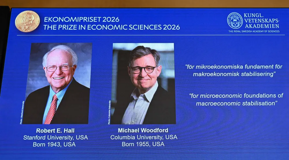 الفائزان بجائزة نوبل في الاقتصاد (أ.ف.ب)