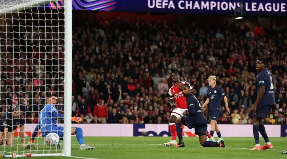 Arsenal's English midfielder #07 Bukayo Saka scores the team's third goal during the UEFA Champions League, league phase football match between Arsenal and Lille at the Emirates Stadium in north London on October 13, 2026. (AFP)