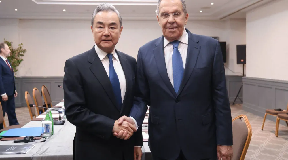 In this handout photograph taken and released by the Russian Foreign Ministry on October 14, 2026, Russia's Foreign Minister Sergei Lavrov and China's Foreign Minister Wang Yi hold a meeting on the sidelines of the Seventh Summit of the Conference on Interaction and Confidence Building Measures in Asia (CICA) in Baku. (Handout /Russian Foreign Ministry / AFP)