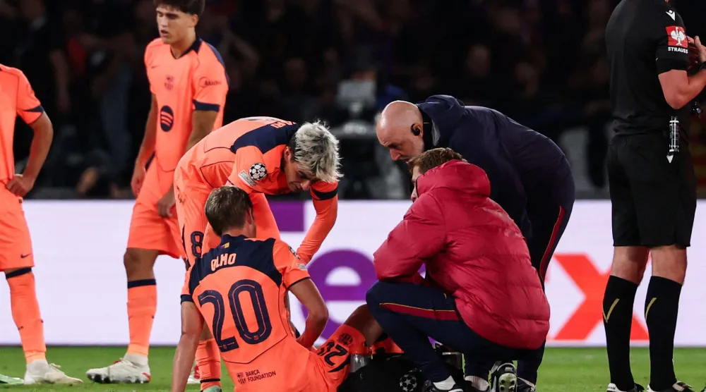لاعب وسط برشلونة داني أولمو عانى من إصابة في العضلة الضامة اليسرى (أ.ف.ب)