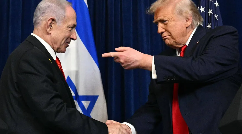 الرئيس الأميركي دونالد ترمب ورئيس الوزراء الإسرائيلي بنيامين نتنياهو (أ.ف.ب)