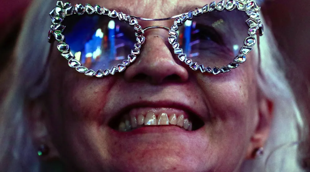 FILE - A fan attends the performance by American singer Jon Batiste at the Rock in Rio music festival in Rio de Janeiro, Sept. 7, 2026. (AP Photo/Bruna Prado, File)