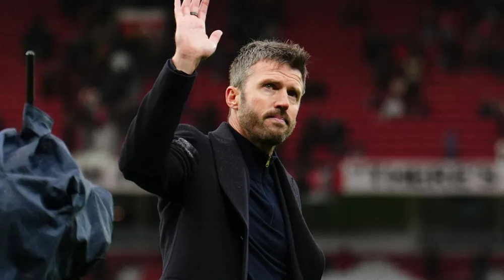  25 October 2026, United Kingdom, Manchester: Manchester United manager Michael Carrick waves after the English Premier League soccer match between Manchester United and AFC Bournemouth at Old Trafford. (dpa)