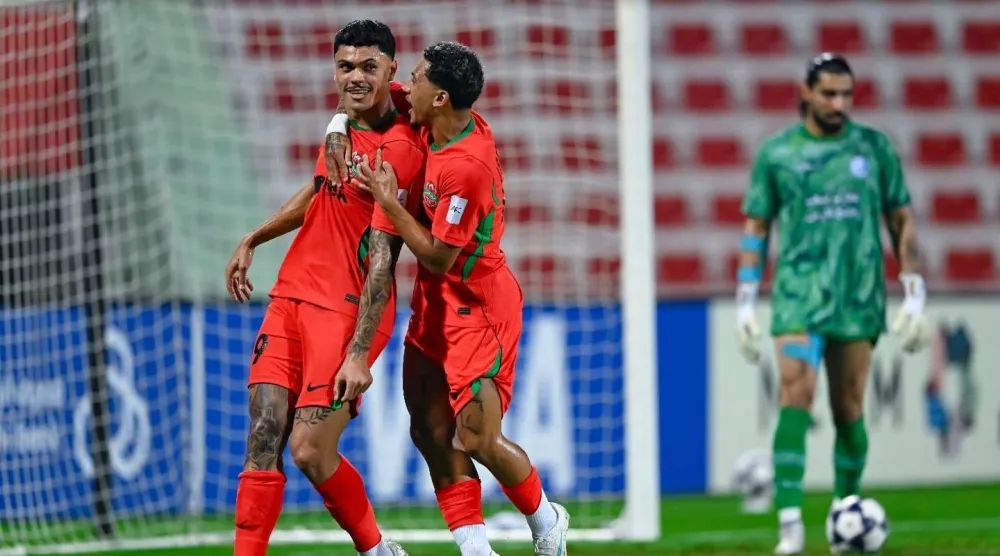فرحة لاعبي شباب الأهلي بالفوز على الاستقلال (الاتحاد الآسيوي)