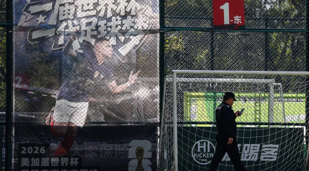 An image of French footballer Kylian Mbappe is displayed at a soccer field in Beijing, China, 28 October 2026. EPA/WU HAO
