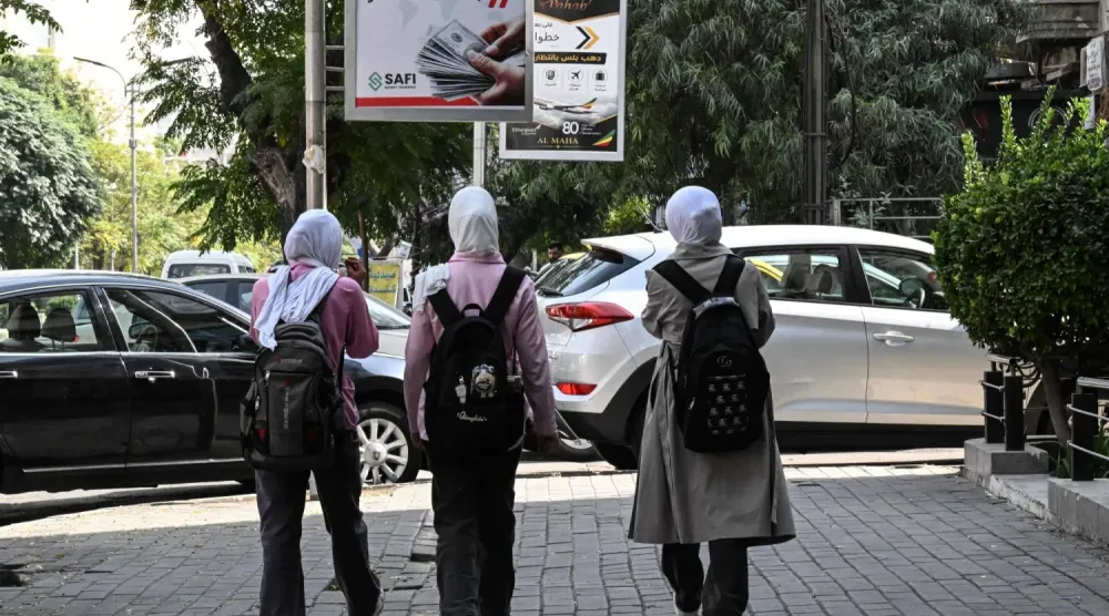 Şam’da okul çıkışı evlerine dönen çocuklar. (AFP)