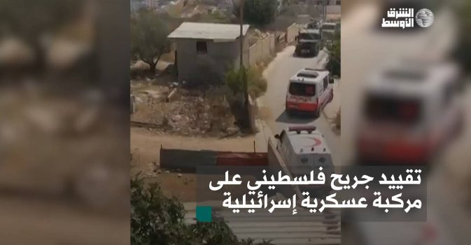 تقييد جريح فلسطيني على مركبة عسكرية إسرائيلية