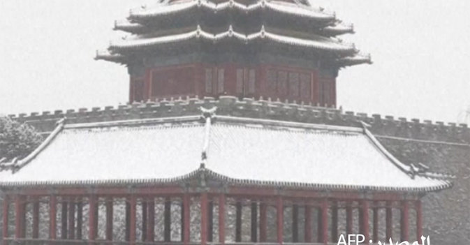 رداء أبيض يغطي "المدينة المحرمة" في الصين