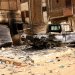مركبة محترقة وسط المعارك في السودان (رويترز)