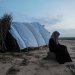 فتاة دارفورية تعرضت لعنف جنسي قبل أن تفر إلى مخيم للاجئين في تشاد (أرشيفية - رويترز)