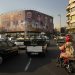 مركبات تسير في ساحة «الثورة الإسلامية» في طهران (أ.ب)