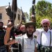 مقاتلون من البدو في قرية المزرعة بضواحي السويداء الجمعة (إ.ب.أ)