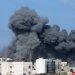 دخان القصف الإسرائيلي فوق دير البلح بوسط قطاع غزة السبت (رويترز)