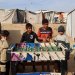 أطفال فلسطينيون يلعبون «البيب فوت» في مخيم النصيرات وسط قطاع غزة السبت (أ.ف.ب)