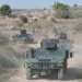 قافلة من الآليات العسكرية اللبنانية قرب الحدود مع إسرائيل في بلدة علما الشعب بجنوب لبنان (أرشيفية - أ.ب)