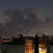 دخان يتصاعد عقب غارات على منطقة باستور المحصنة في طهران فجر الجمعة (رويترز)