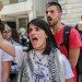 تظاهر نشطاء أمام وزارة الخارجية في أثينا مطالبين بتدخل بلادهم بعد أن اعترضت القوات الإسرائيلية سفن مساعدات تابعة لأسطول غزة (رويترز)