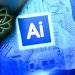 الحرفان «AI» (اختصاراً لمصطلح الذكاء الاصطناعي) على شاشة حاسوب محمول (أ.ف.ب)